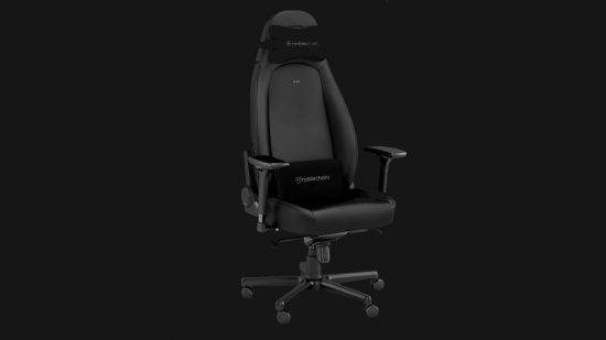 Black gaming chair on black background