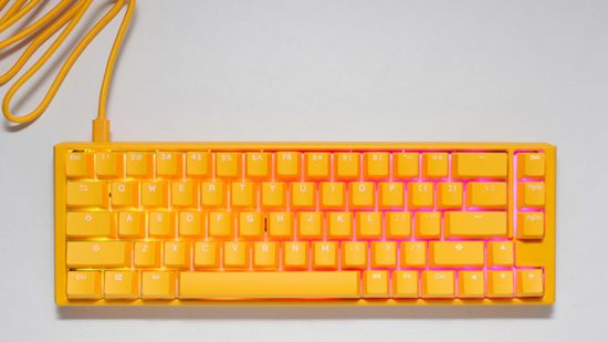 A top down views of the Ducky One 3 SF mechanical gaming keyboard, in its yellow colour scheme