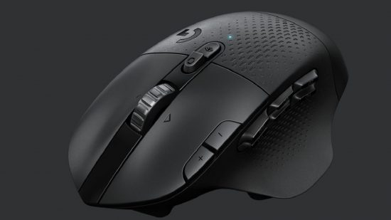 Black gaming mouse on black background