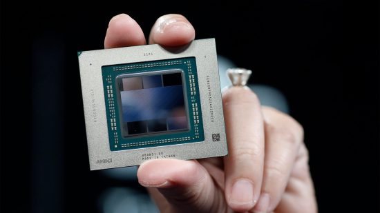 AMD Navi 31 RDNA 3 chip in Lisa Su's hand