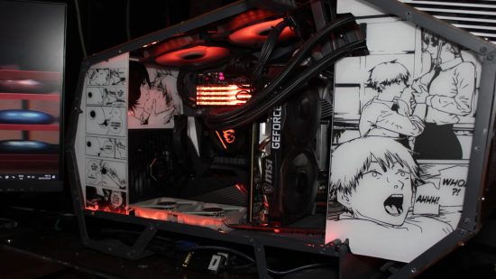 A varying side view of the Pochita PC build shocwing the black and white manga panels